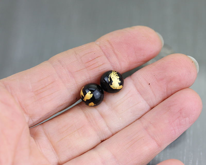 Black and gold silver stud earrings