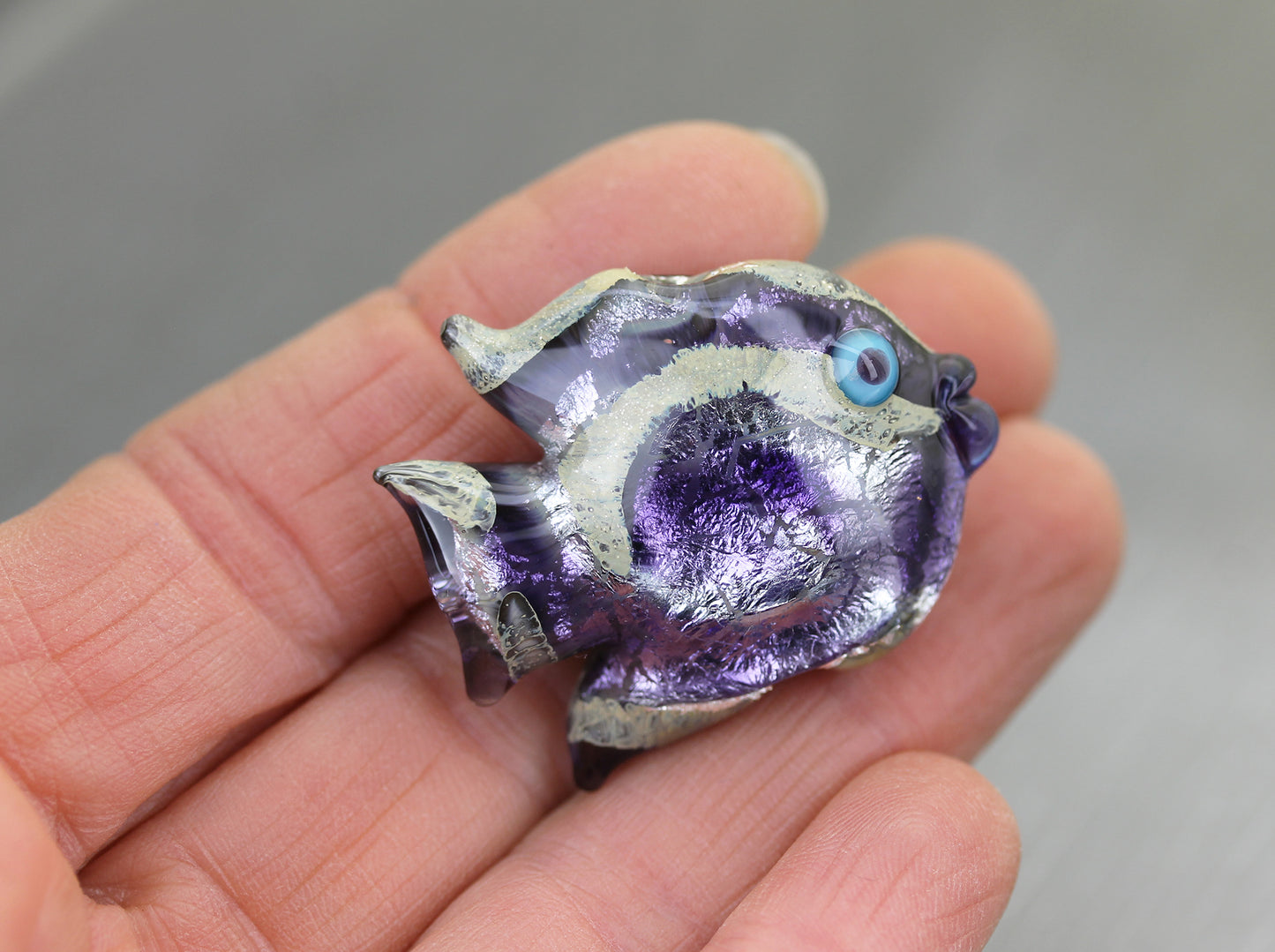 Perle poisson Sea Rocks spirale violette #0125003
