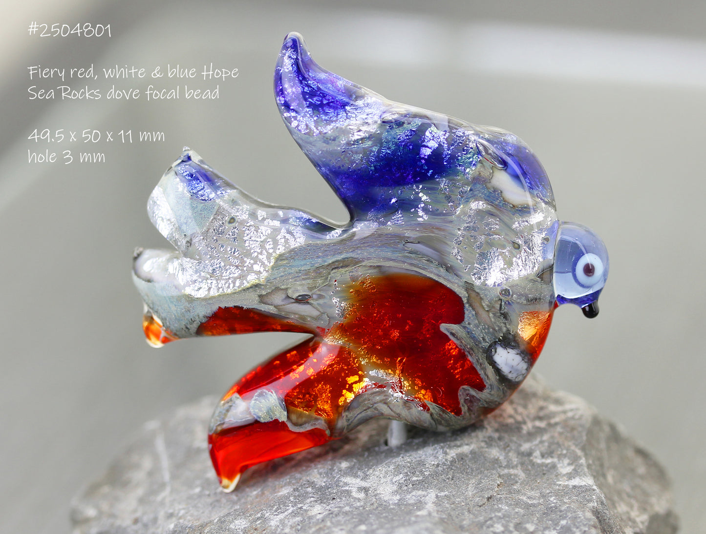 #2504801 - Large fiery red, white & blue Hope dove focal bead