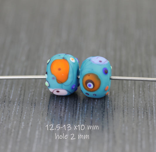 #124072 - Etched Miro turquoise bead pair