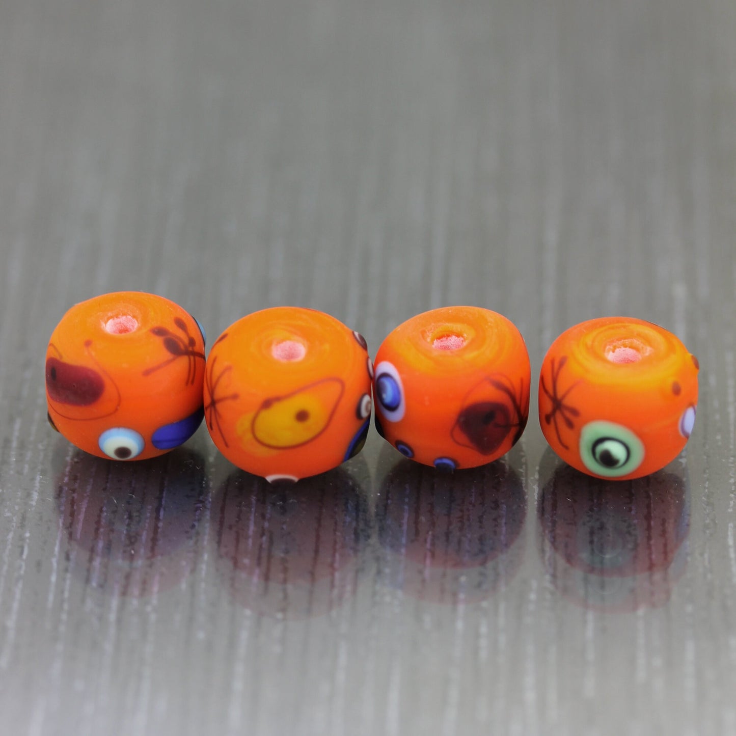 4 Perles en verre oranges Miro. Lot de Perles de verre au chalumeau intercalaires. Artisan lampwork perles d'art Anne Londez SRA OOAK