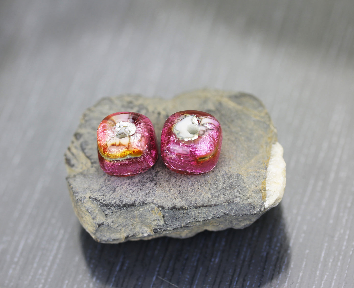 pair of hot pink sparkling Sea Rocks lampwork glass bead pairs by Anne Londez shaped like dice or cubes