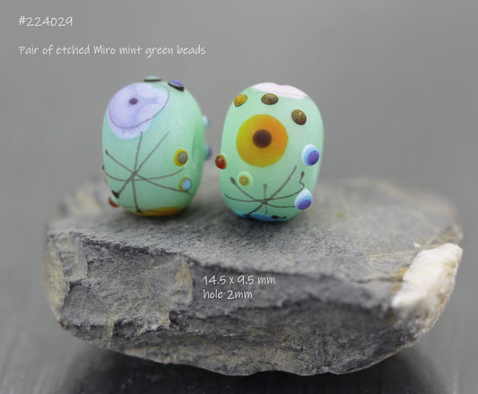 Pair of mint green Miro beads #224029