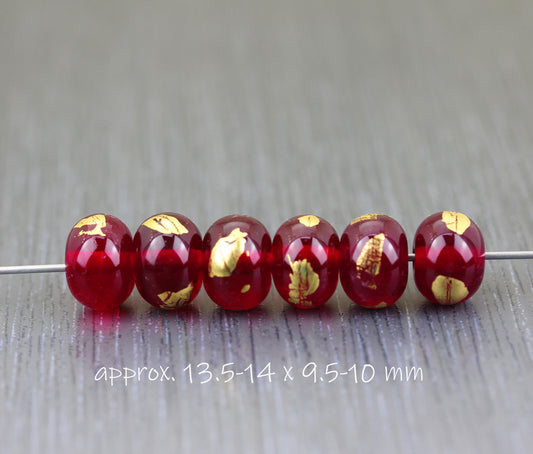 Dark transparent red and gold beads 