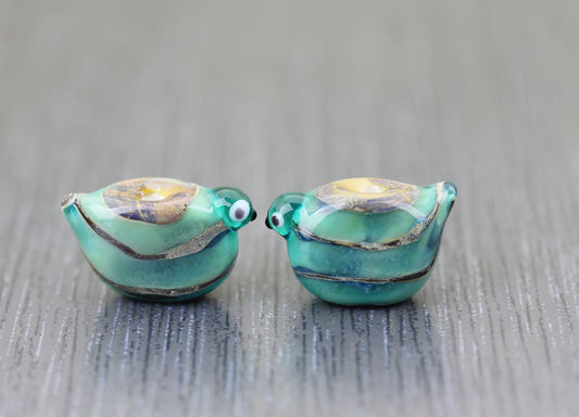 Turquoise blue Sea Rocks bird bead pair MTO