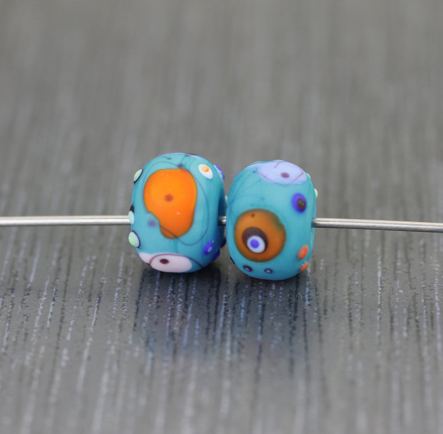 Pair of turquoise blue MIro beads MTO