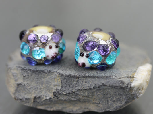 Pair of aqua, cobalt & purple blue Sea Rocks hedgehog beads 