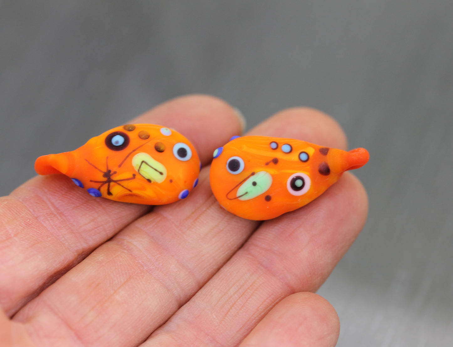 Orange Miro Fish Bead Pair