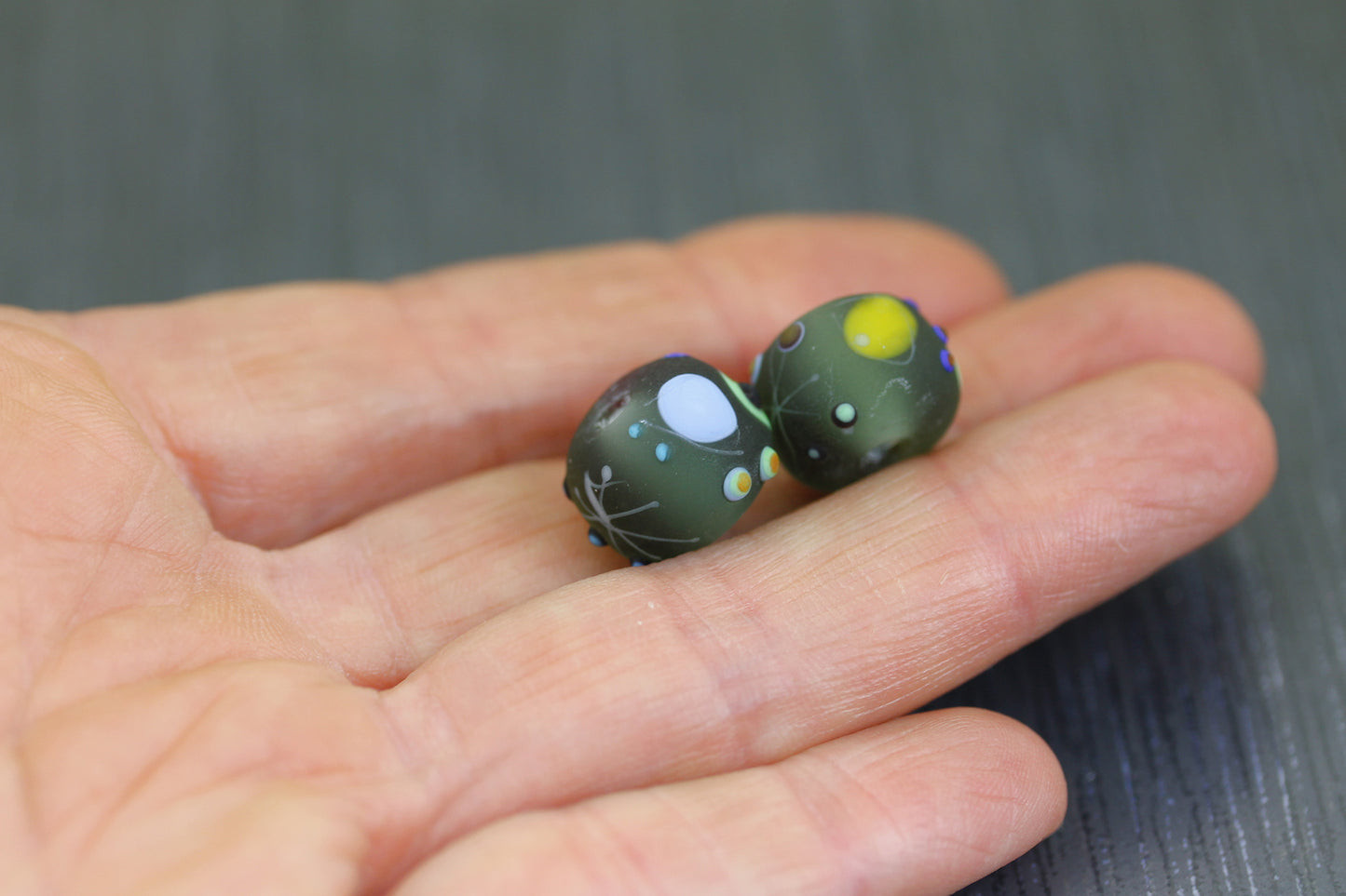 Pair of etched gray Miro beads