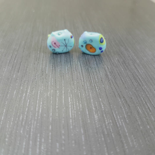 Pair of turquoise Cat Miro beads MTO